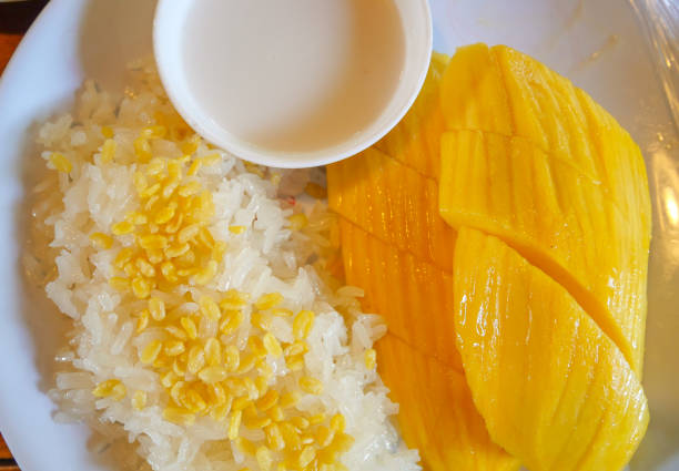 Sweet mango with steamed sticky rice with coconut milk, Thai dessert