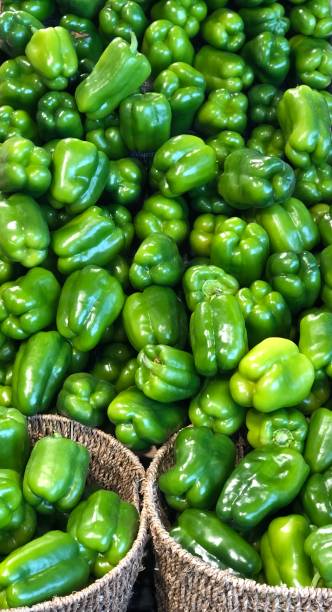 istock Green peppers on display at the market 1167795028