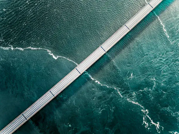 Photo of Bridge in Iceland going over the sea seen from above