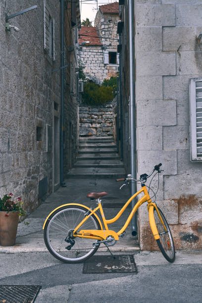 istock Yellow bicycle on the street 1167797143