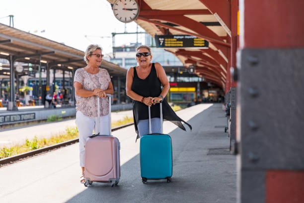 istock Two senior ladies at a train station 1167798795