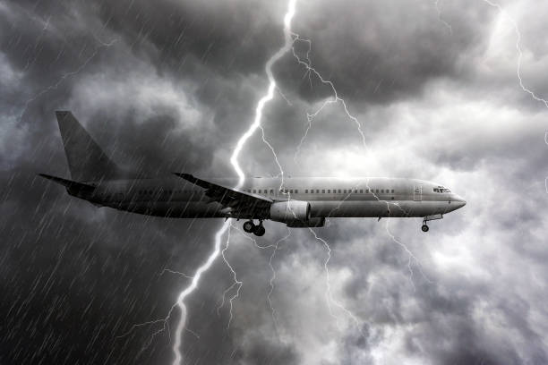 istock Airplane during heavy rain, storm with thunderstorm lightning, stormy weather on the backdrop 1167799746