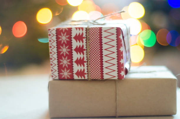istock Christmas presents on Christmas Tree background 1167802081