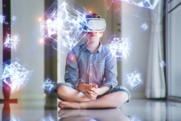istock A boy in virtual glasses learning geometric shapes holograms. 1167803091