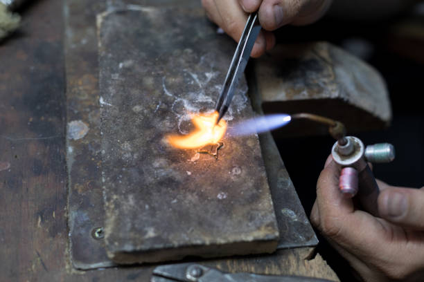 istock Goldsmith is repairing a gold 1167803233