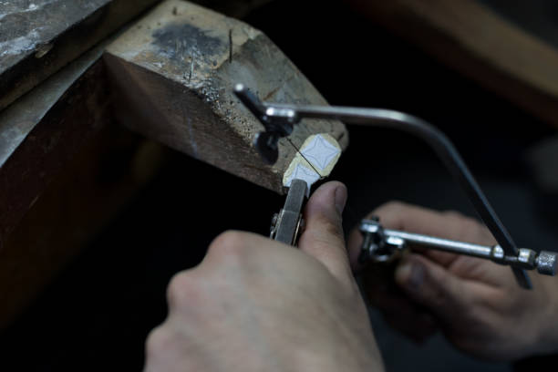 istock Jeweler crafting metal in workshop 1167803804