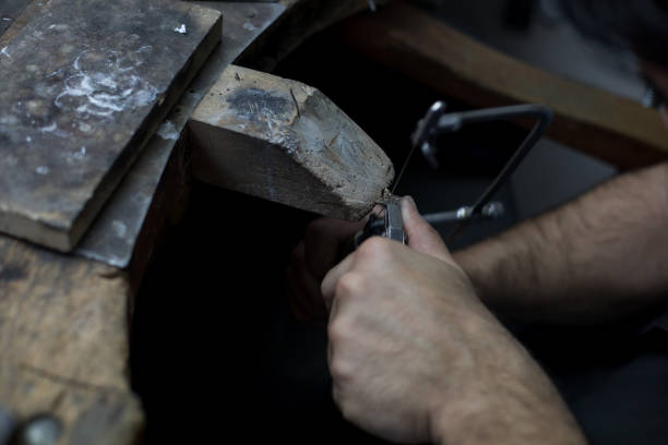 istock Jeweler crafting metal in workshop 1167803861