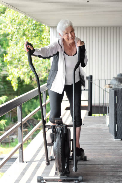 istock 84 years old senior woman exercising 1167804967