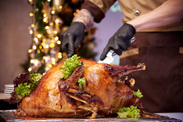 istock Appetizing baked turkey on a tray in a restaurant. 1167809333
