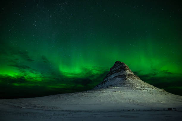 istock Mount kirkjufell in iceland with aurora borealis 1167809352