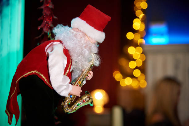 istock Decorative Santa Claus with a saxophone. 1167809420