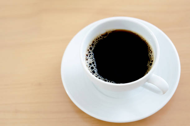 istock Cup of coffee on weathered table 1167810390