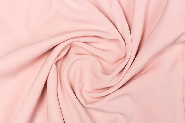 istock pink rose fabric texture background, pastel satin fabric texture background 1167817524