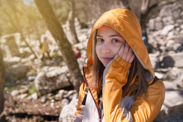 istock Girl laughing at the landscape 1167818246