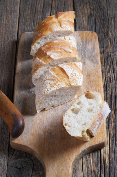 istock Sliced fresh bread and knife 1167822215