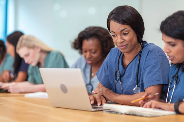 istock Multi-ethnic group of nursing students in class 1167824460
