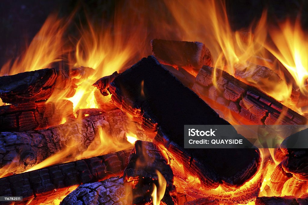 Fire wood burning on a fire with red hot flames Accidents and Disasters Stock Photo