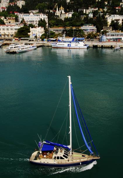 istock Small blue boat passes other blue boats on the Bosphorus Straight, Turkey, 2013. 1167825802