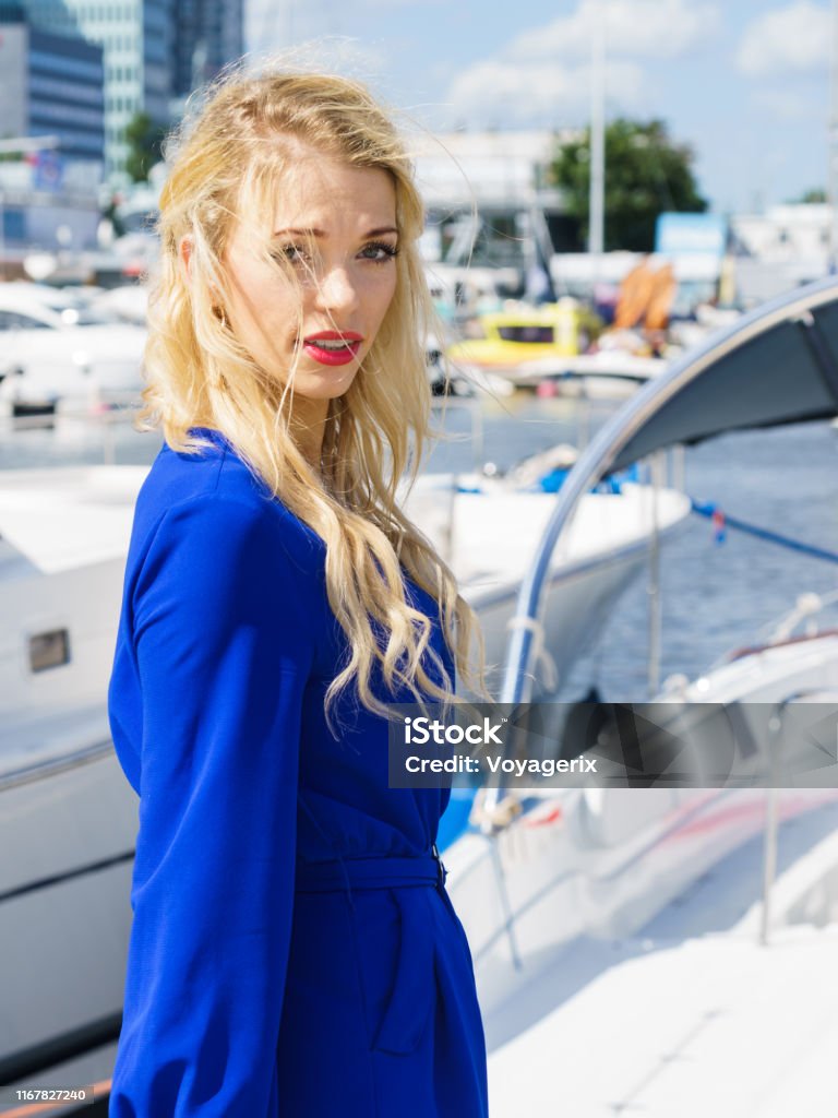 Fashion Model Wearing Blue Jumpsuit Stock Photo - Download Image Now ...