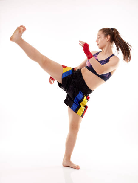 istock Kickboxing girl on white 1167828486