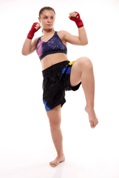istock Kickboxing girl on white 1167828574