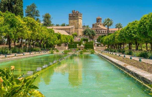 the beautiful alcazar de los reyes cristianos (alcazar of the christian monarchs) in cordoba, andalusia, spain. - ancient arabic style arch architecture imagens e fotografias de stock