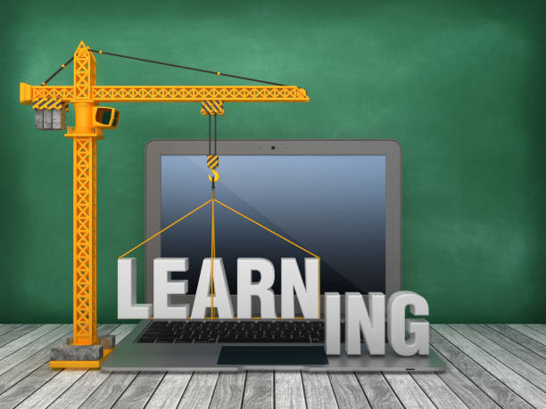 istock Tower Crane and Laptop with LEARNING Word on Chalkboard Background - 3D Rendering 1167831504