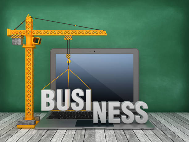 istock Tower Crane and Laptop with BUSINESS Word on Chalkboard Background - 3D Rendering 1167831522