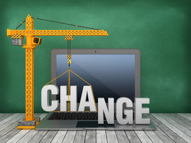 istock Tower Crane and Laptop with CHANGE Word on Chalkboard Background - 3D Rendering 1167831565