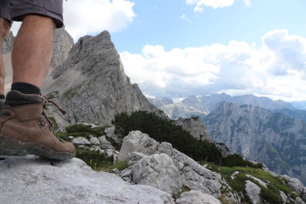 istock Hiking over rocks on a mountain trail 1167831987