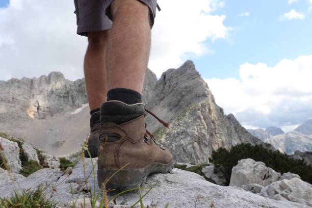 istock Hiking over rocks on a mountain trail 1167831988