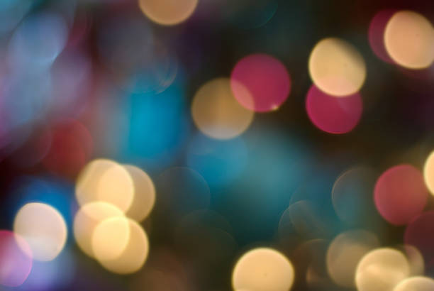 Blurry image of variously colored fairy lights stock photo