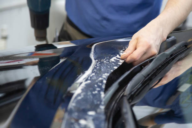 istock car paint protection film installing 1167835365