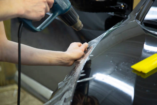 istock car paint protection film installing 1167835441