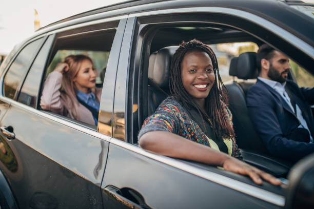 istock Friends driving in a car 1167837002