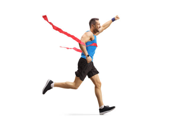 istock Male athlete on the finish line of a race gesturing happiness 1167838607