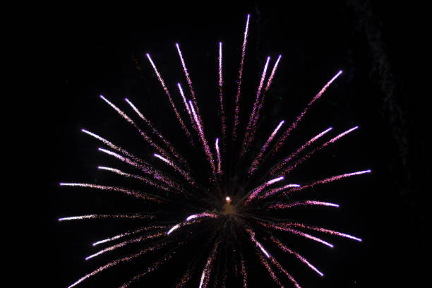 istock Fireworks in the night sky over the city 1167838966