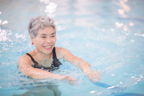 istock Senior women swimming 1167839683