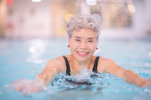 istock Senior women swimming 1167839686