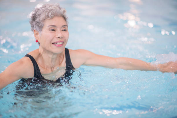 istock Senior women swimming 1167839687