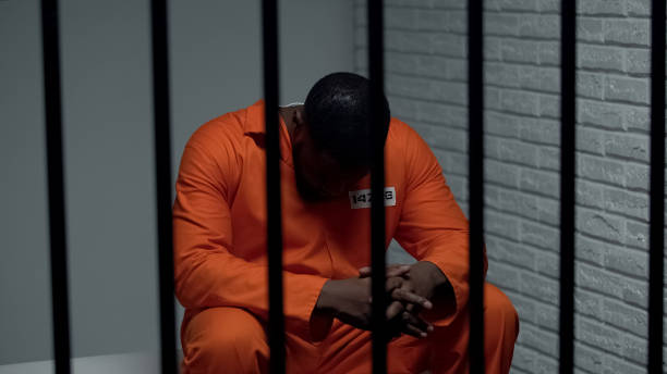 istock Pensive african-american prisoner waiting for visitors, serving life sentence 1167840181