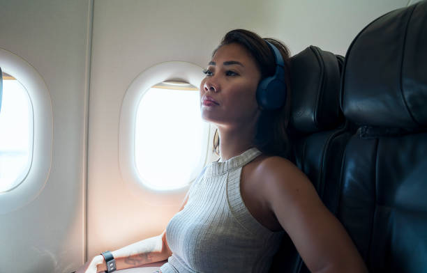 istock Woman anxious and frightened in Airplane 1167842008