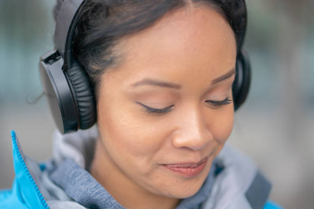 istock Woman with headphones 1167843339