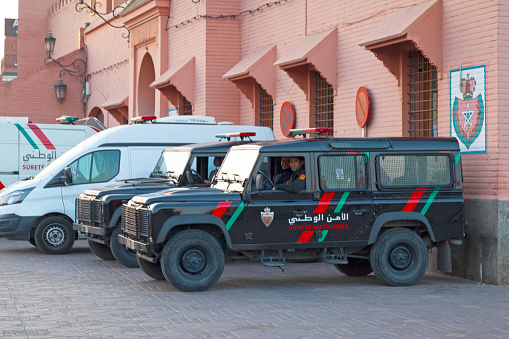Marrakesh, Morocco - January 15 2018: Vehicles of the Sûreté Nationale parked outside the presinct in Jemaa el-Fnaa.
