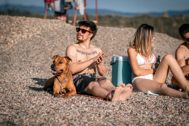 istock Friends partying and having fun on beach at summer. 1167847915