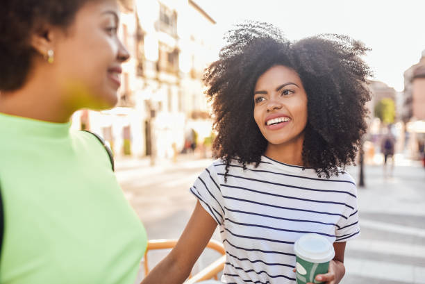 istock Girls having fun on the street 1167848241