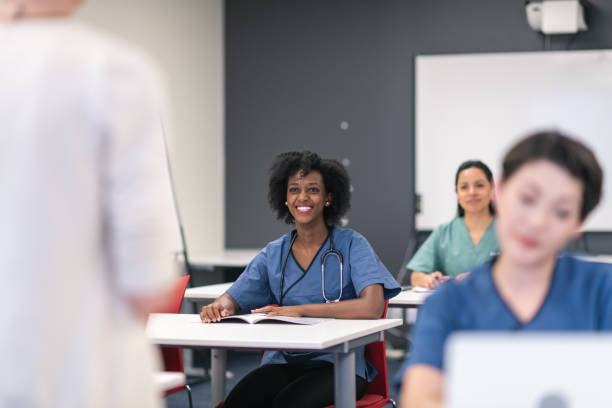 istock Multi-ethnic group of students attend medical training course in lecture hall 1167849760