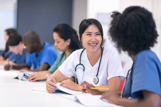 istock Multi-ethnic group of students in medical training class 1167849787