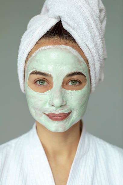 istock Young Woman with Green Mask 1167852762