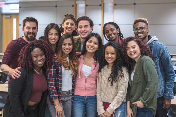 istock Multi-Ethnic Group of University Students Sitting Inside Together 1167863747